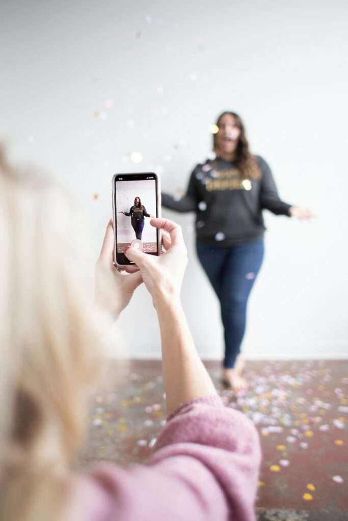 a girl creating TikTok video