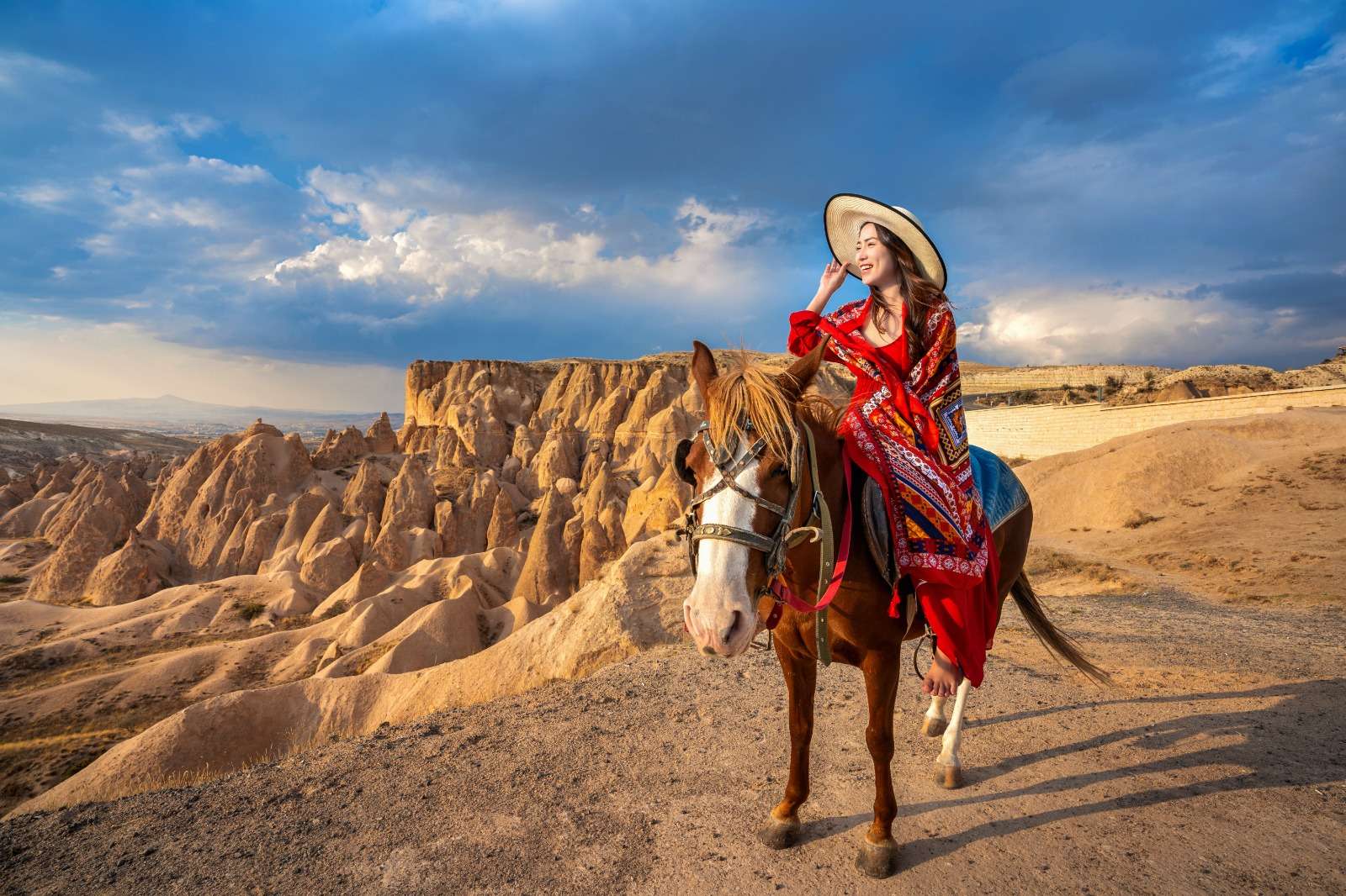 woman on the camel in desert, gcc tourism industry